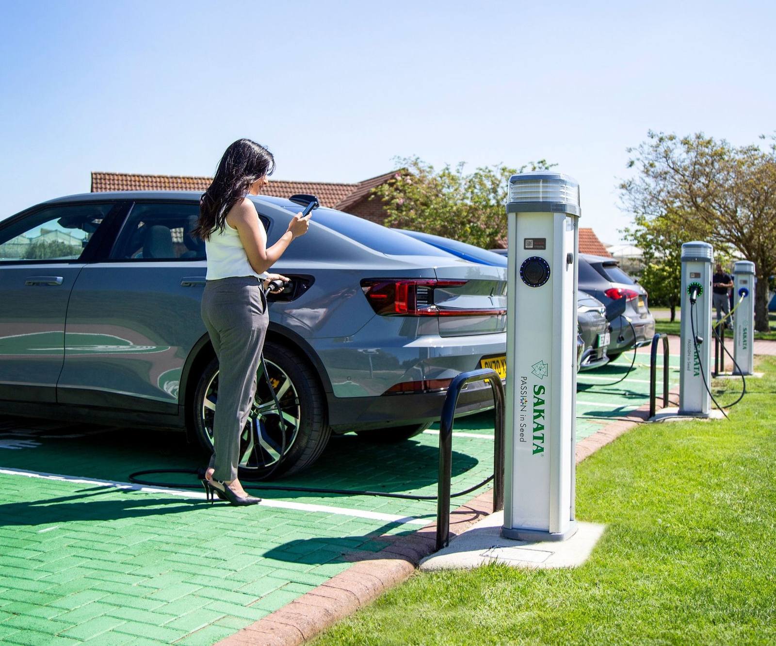 Charge posts in a landscaped commercial car park